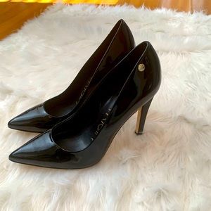 Calvin Klein black patent pumps
